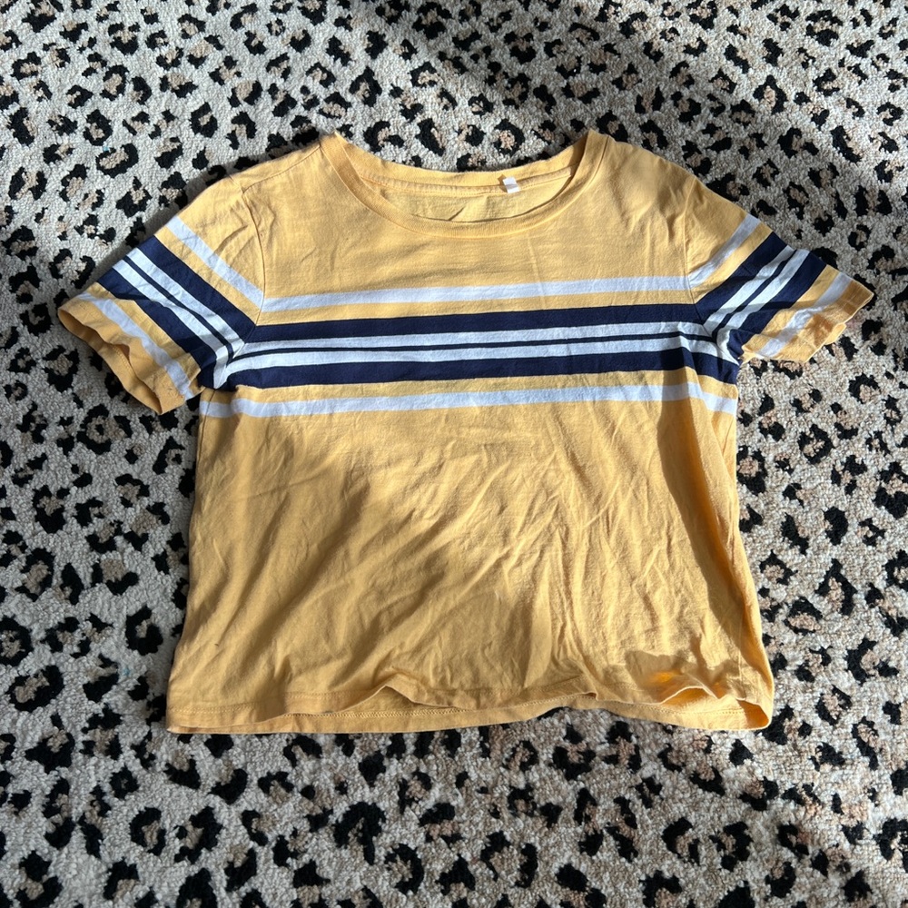 Yellow and navy blue striped cough drop